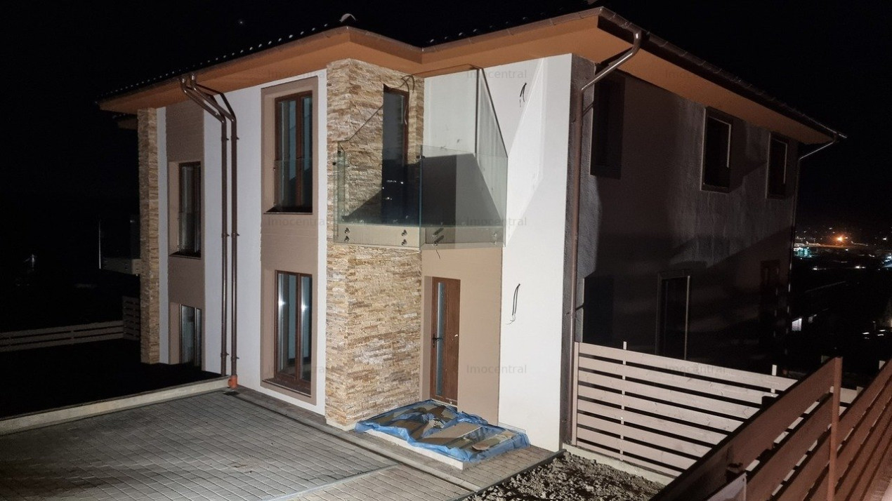 Casa moderna, cu gradina si loc de parcare in Dezmir