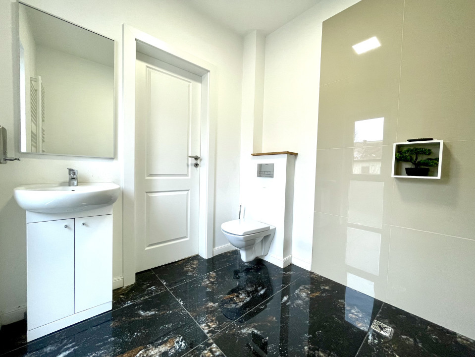 Birou ultrafinisat, curte privată și 3 locuri de parcare